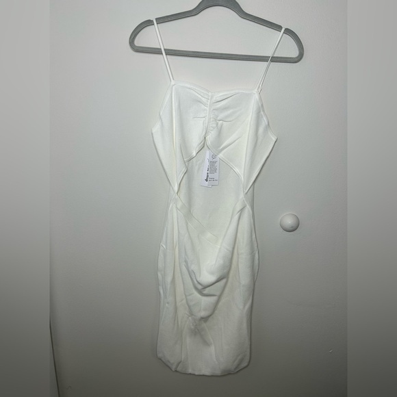 Elegant White Spaghetti Strap Dress - Picture 1 of 4